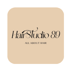 Logo of Hair Studio 89 featuring elegant typography on a beige background.